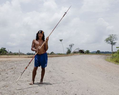 Davo Enomenga of the Waorani tribe in Yasuní, Ecuador.
holding a spear.