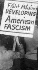 protest sign: Fight Against Developing American Fascism