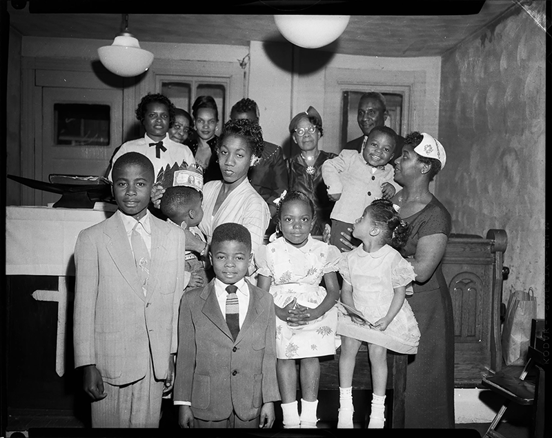 Women, children, and a man in the interior of small church in Pittsburgh, Penn., 
c. 1950-1970.