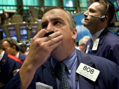 Broker With Hand On His Face