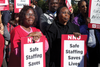 Nurses from Providence Hospital with National Nurses United (NNU) on strike in Providence, R.I., November 12, 2014. Credit: UFCW Local 400, CC BY 2.0 license.