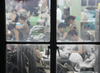Garment workers in a factory in Jiaxing, China, July 21, 2008. Credit: Flickr user Matt (flickr.com/photos/memn/27164 35026), CC BY 2.0 license.