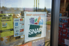 "SNAP welcomed here" sign at the entrance to a Big Lots store in Portland, Ore., October 28, 2020.  Credit: Tada Images, via Adobe Stock. 